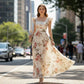 👗 40% OFF! ✨ Floral Pleated Maxi Dress – Square Neck, Ruffle Sleeves, High-Waist 🌸