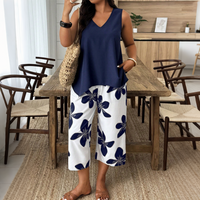 🌸 40% OFF! ✨ Women's Asymmetrical Top & Floral Print Capri Pants Set – Versatile, Vibrant, Comfortable 🌺